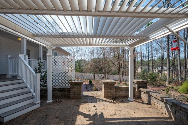 view of patio featuring a pergola