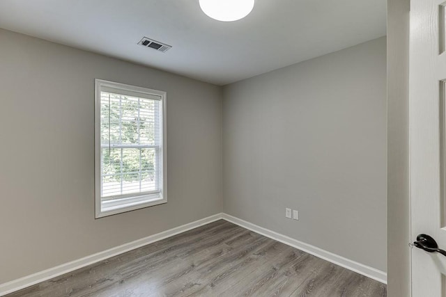 4690 Martins Crossing W Dr, Flowery Branch, GA 30542 - empty room featuring wood finished floors and baseboards