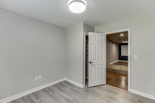 4690 Martins Crossing W Dr, Flowery Branch, GA 30542 - unfurnished room featuring wood finished floors and baseboards