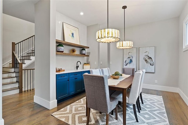 660 Timm Valley Rd NE, Atlanta, GA 30305 - dining room with stairway, recessed lighting, wet bar, dark wood-type flooring, and baseboards