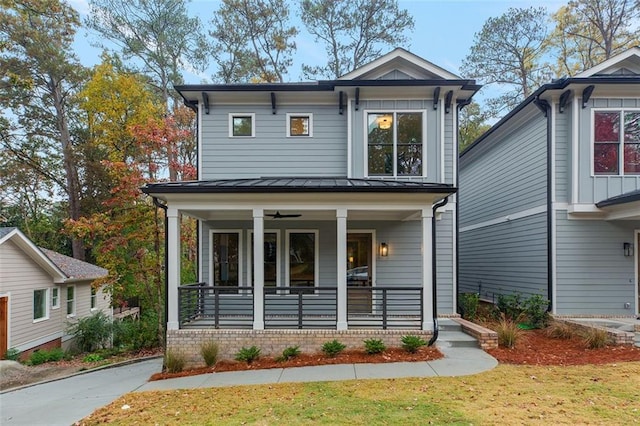 660 Timm Valley Rd NE, Atlanta, GA 30305 - view of front of house with metal roof, a standing seam roof, a porch, and a ceiling fan