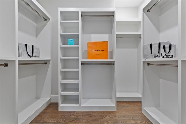 walk in closet featuring hardwood / wood-style floors