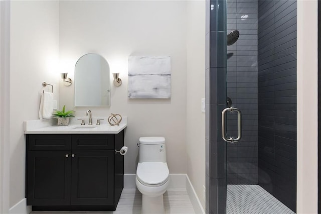 bathroom with walk in shower, vanity, and toilet