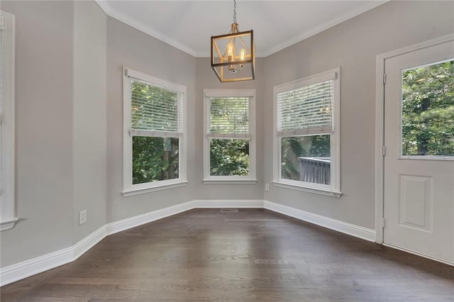 420 Gold Xing, Canton, GA 30114 - unfurnished dining area with plenty of natural light, dark wood-style floors, a chandelier, and crown molding