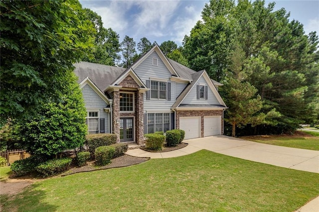 420 Gold Xing, Canton, GA 30114 - view of front facade featuring driveway, a garage, a front lawn, and brick siding