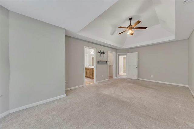 420 Gold Xing, Canton, GA 30114 - unfurnished living room featuring a raised ceiling, ceiling fan, and light colored carpet