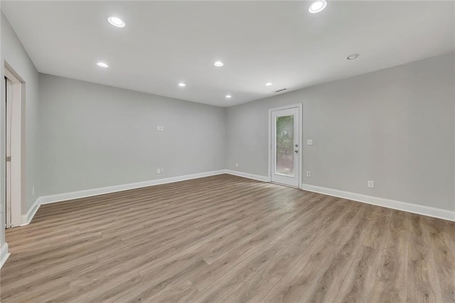 420 Gold Xing, Canton, GA 30114 - unfurnished room with light wood-style flooring and recessed lighting