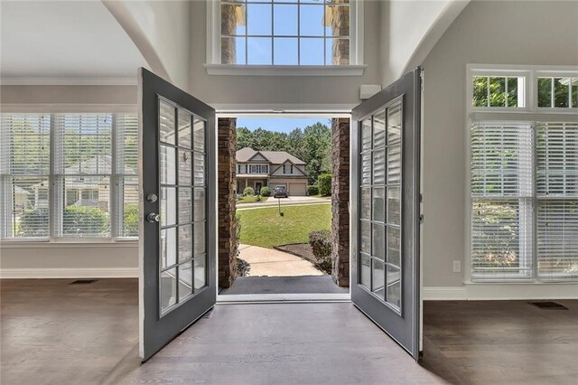 420 Gold Xing, Canton, GA 30114 - foyer featuring french doors, healthy amount of natural light, crown molding, and wood finished floors
