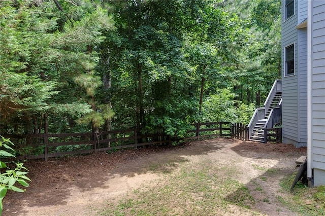 420 Gold Xing, Canton, GA 30114 - view of yard with stairway and a view of trees