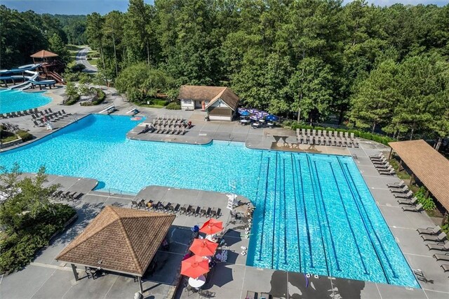 420 Gold Xing, Canton, GA 30114 - community pool with a patio and a forest view