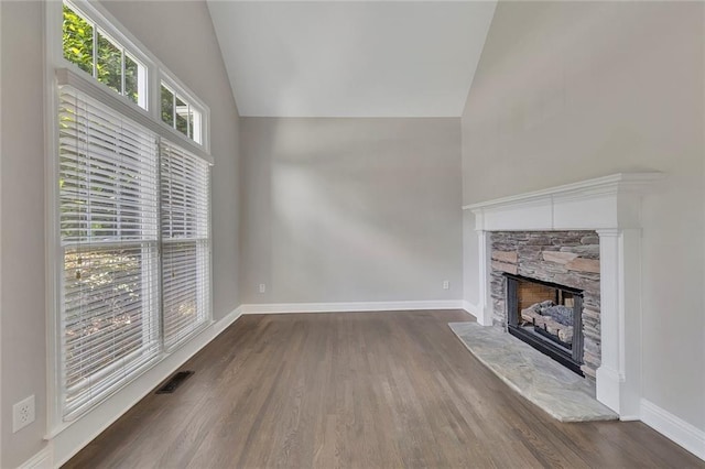420 Gold Xing, Canton, GA 30114 - unfurnished living room featuring a fireplace, dark wood-style flooring, and high vaulted ceiling