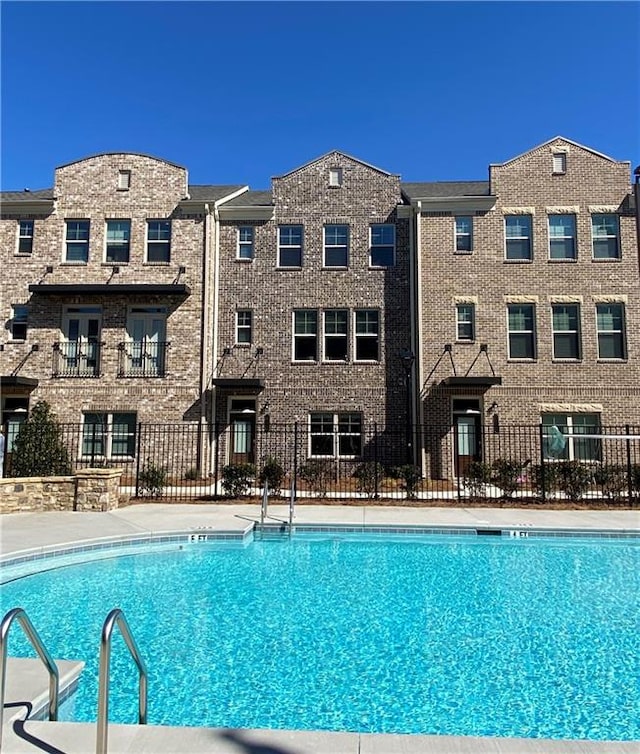 view of swimming pool featuring a patio