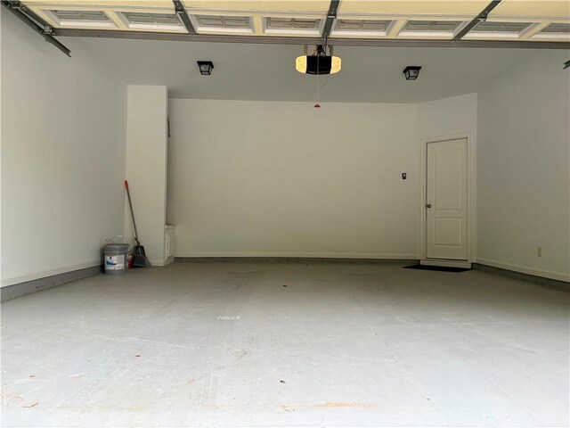 garage featuring a garage door opener