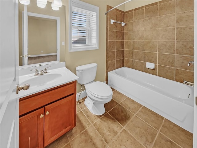 bathroom with tile patterned floors, toilet, vanity, and bathtub / shower combination