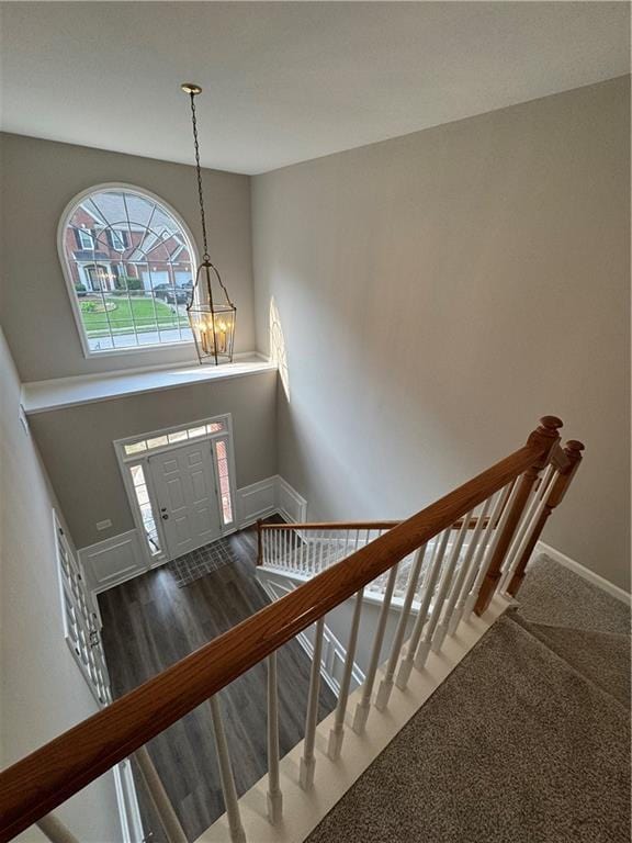 1415 Stoney Field Pl, Lawrenceville, GA 30043 - foyer entrance featuring a chandelier, baseboards, a towering ceiling, and stairway