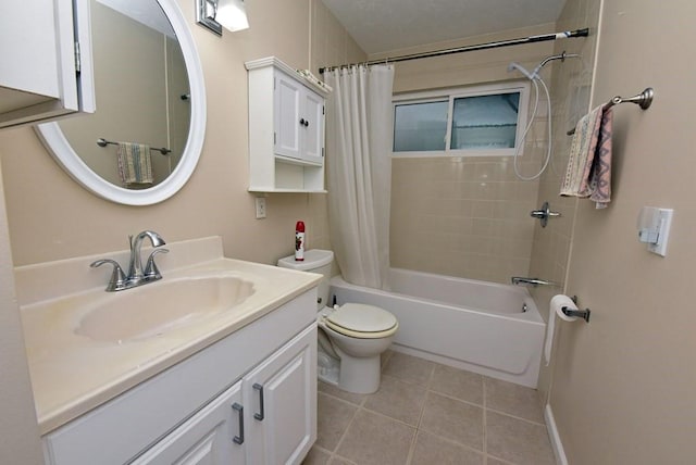 full bathroom with tile patterned floors, vanity, toilet, and shower / tub combo