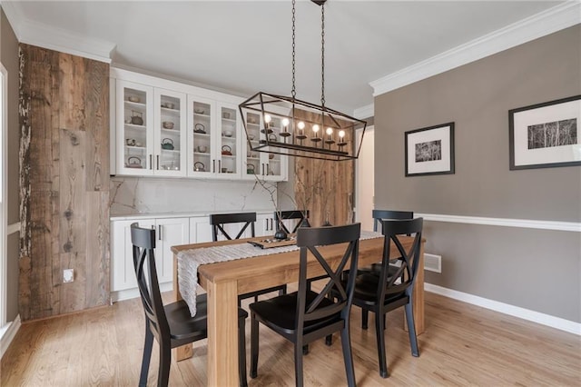 4030 Scenic View Ct, Cumming, GA 30028 - dining area with crown molding, visible vents, baseboards, light wood finished floors, and a notable chandelier