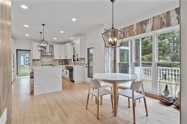 4030 Scenic View Ct, Cumming, GA 30028 - dining room featuring crown molding, an inviting chandelier, and plenty of natural light