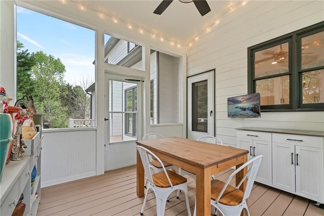 4030 Scenic View Ct, Cumming, GA 30028 - sunroom / solarium with a deck, wood walls, and hardwood / wood-style flooring