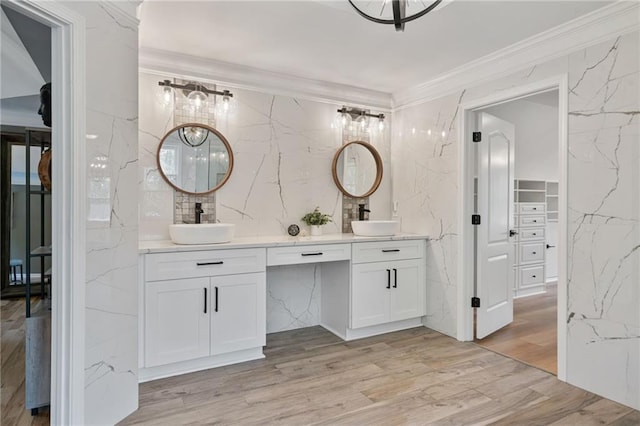 4030 Scenic View Ct, Cumming, GA 30028 - bathroom with double vanity, wood finished floors, ornamental molding, and a sink