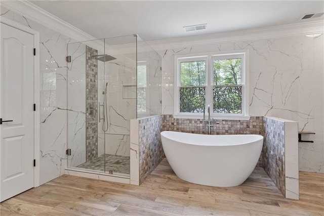 4030 Scenic View Ct, Cumming, GA 30028 - full bathroom featuring crown molding, a marble finish shower, visible vents, and a freestanding tub
