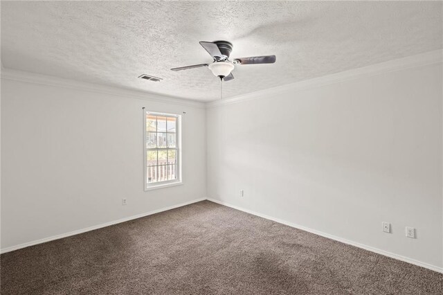 carpeted empty room with crown molding, ceiling fan, and a textured ceiling