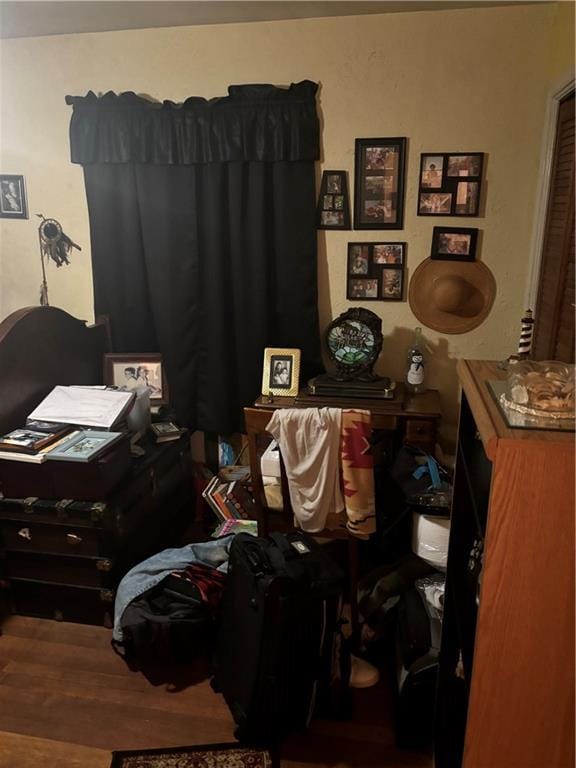 bedroom featuring hardwood / wood-style floors