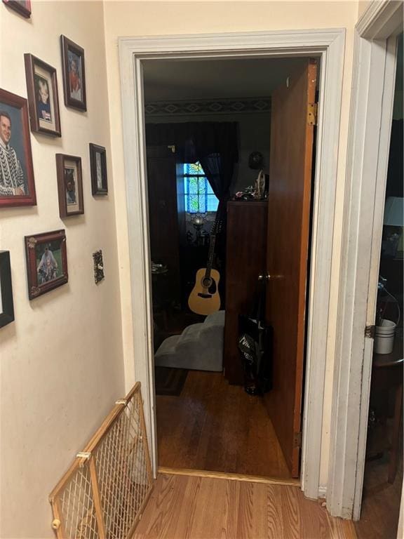 corridor featuring light hardwood / wood-style flooring