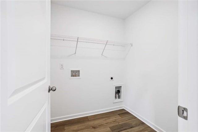 laundry area featuring hookup for a washing machine, dark hardwood / wood-style floors, and hookup for an electric dryer