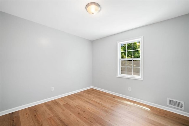 3050 Woodland Dr NW, Kennesaw, GA 30152 - spare room featuring light wood finished floors and baseboards