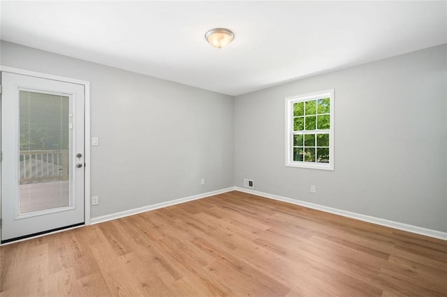 3050 Woodland Dr NW, Kennesaw, GA 30152 - spare room featuring light wood-style floors and baseboards