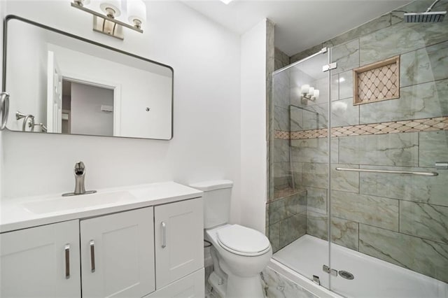 3050 Woodland Dr NW, Kennesaw, GA 30152 - bathroom featuring toilet, a shower stall, and vanity