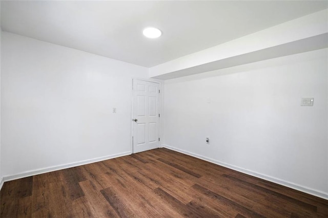 3050 Woodland Dr NW, Kennesaw, GA 30152 - unfurnished room featuring dark wood-style flooring and baseboards
