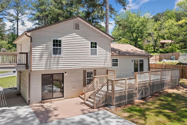 3050 Woodland Dr NW, Kennesaw, GA 30152 - back of property with a patio area and a deck