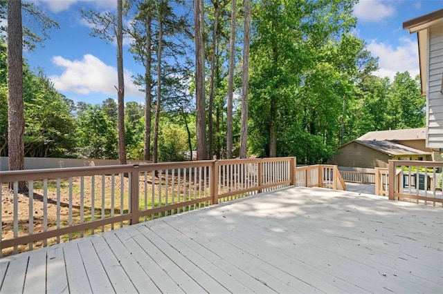 3050 Woodland Dr NW, Kennesaw, GA 30152 - wooden deck featuring view of scattered trees
