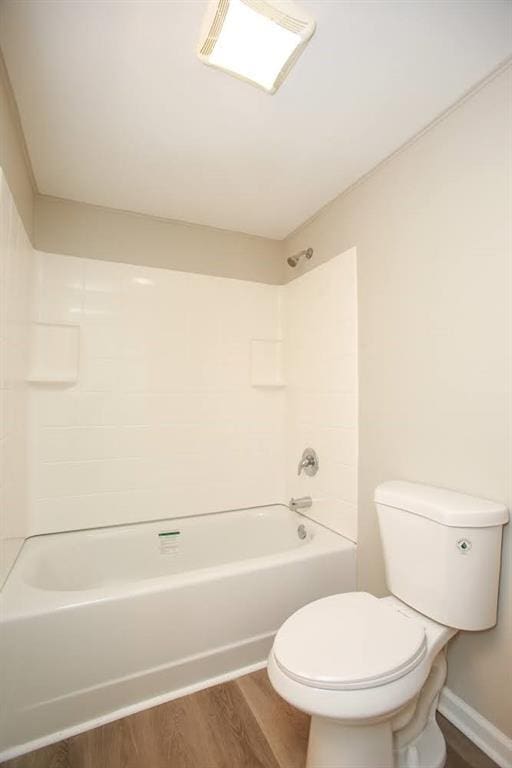 272 Old Sudie Rd, Hiram, GA 30141 - full bath featuring wood finished floors, toilet, shower / bathtub combination, and baseboards