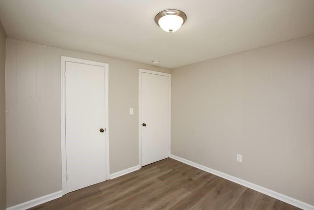 272 Old Sudie Rd, Hiram, GA 30141 - unfurnished bedroom with wood finished floors, baseboards, and a closet
