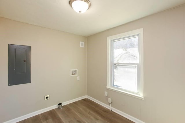 272 Old Sudie Rd, Hiram, GA 30141 - laundry room with electric panel, hookup for an electric dryer, dark wood-type flooring, washer hookup, and baseboards