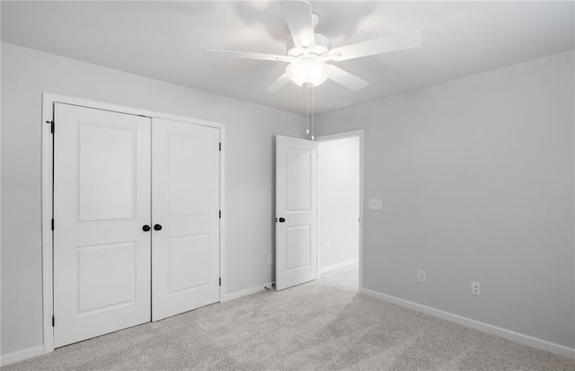 404 Beacon Way, Villa Rica, GA 30180 - unfurnished bedroom with carpet flooring, baseboards, a closet, and ceiling fan