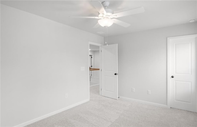 unfurnished bedroom with baseboards, ceiling fan, and carpet flooring
