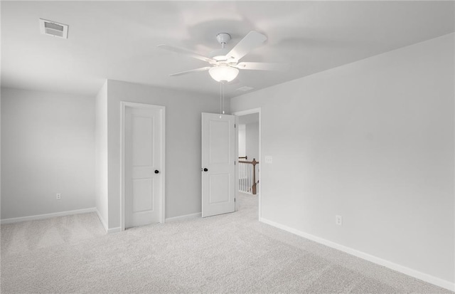 404 Beacon Way, Villa Rica, GA 30180 - unfurnished bedroom featuring baseboards, carpet floors, and ceiling fan