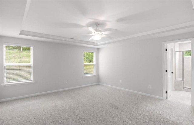 404 Beacon Way, Villa Rica, GA 30180 - unfurnished room with a tray ceiling, a ceiling fan, carpet flooring, and baseboards