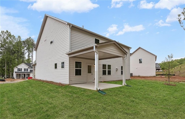 404 Beacon Way, Villa Rica, GA 30180 - rear view of house with a patio and a lawn