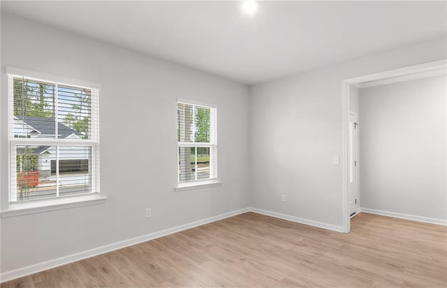 404 Beacon Way, Villa Rica, GA 30180 - spare room with light wood finished floors and baseboards