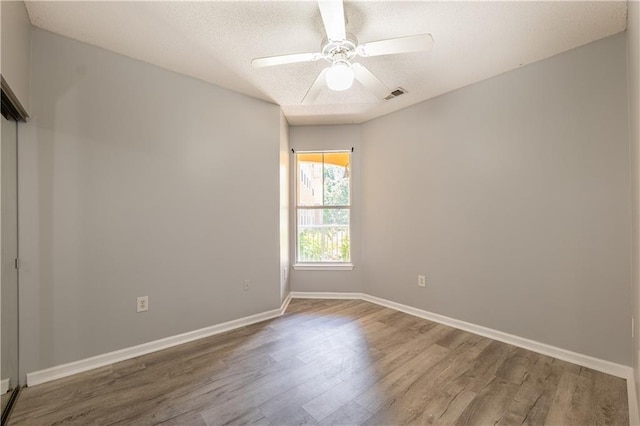 10 NE Perimeter Summit Blvd Unit 3107, Atlanta, GA 30319 - unfurnished room with wood finished floors, a textured ceiling, and ceiling fan