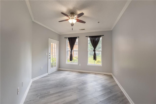 10 NE Perimeter Summit Blvd Unit 3107, Atlanta, GA 30319 - unfurnished room featuring healthy amount of natural light, a textured ceiling, ceiling fan, wood finished floors, and ornamental molding