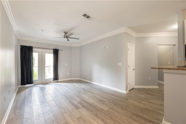 10 NE Perimeter Summit Blvd Unit 3107, Atlanta, GA 30319 - spare room with ceiling fan, crown molding, light wood-style flooring, and a textured ceiling