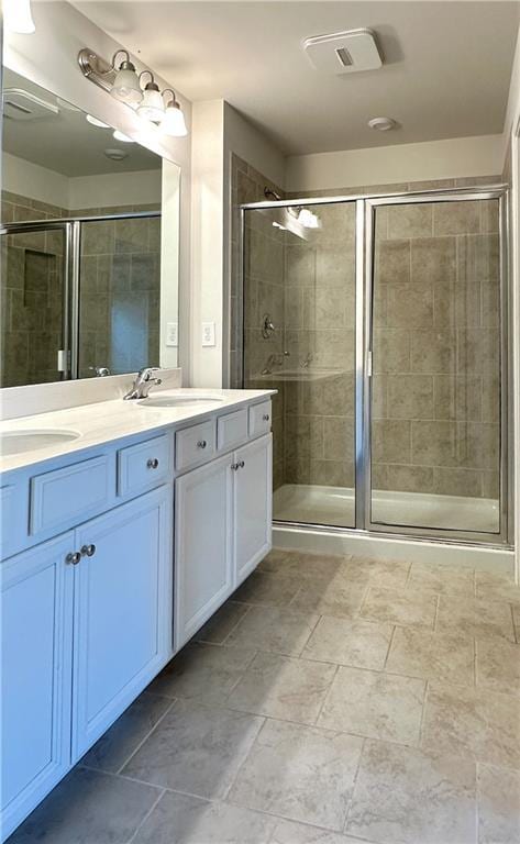 3658 Hidden Valley Cir, Lawrenceville, GA 30044 - bathroom with a sink, double vanity, and a stall shower