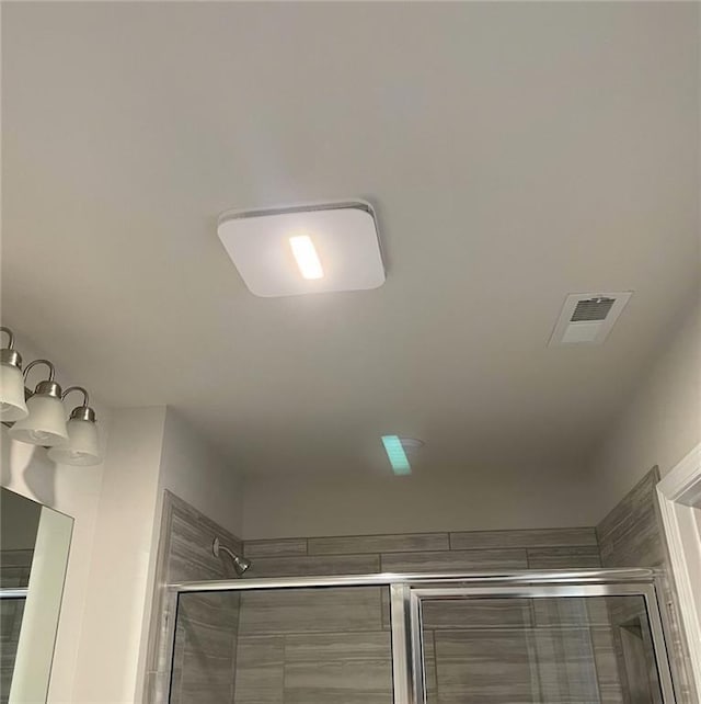 3658 Hidden Valley Cir, Lawrenceville, GA 30044 - room details with visible vents and a tile shower