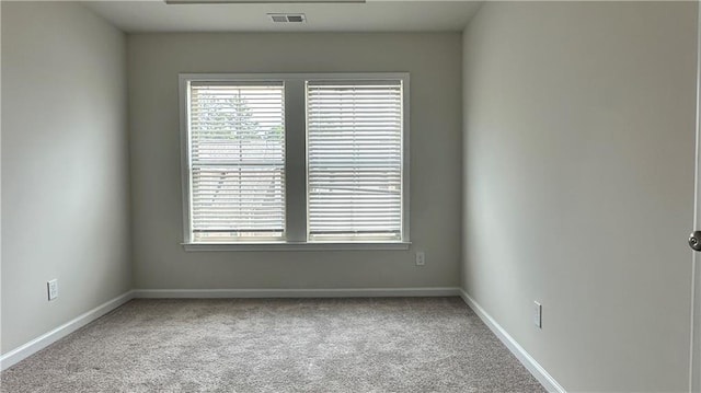 3658 Hidden Valley Cir, Lawrenceville, GA 30044 - unfurnished room featuring baseboards, visible vents, a wealth of natural light, and carpet flooring